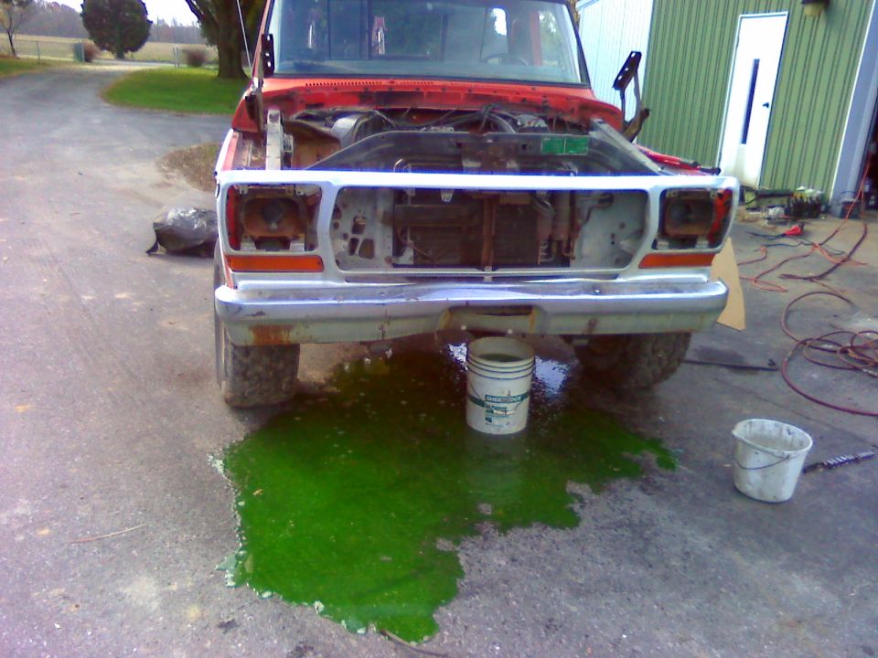 1979 Ford F-100 front view, hood open, coolant spilled