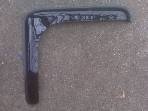 1995 Ford Bronco - Fender flare part shown on the ground.