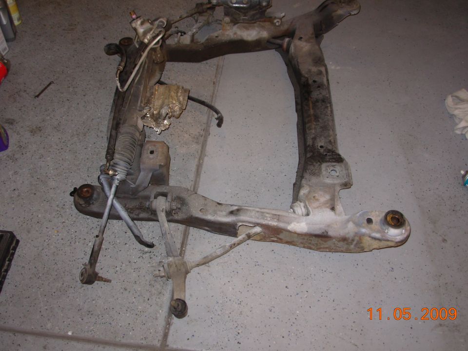 Front subframe with steering rack and suspension components