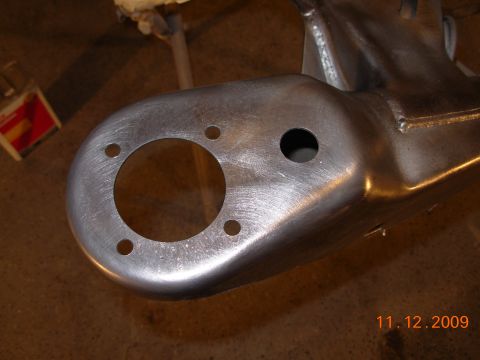 1991 Ford Taurus - Close-up of a bare metal suspension part, possibly from a project car build.