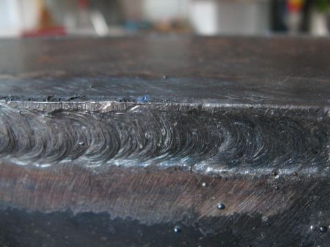 1995 Ford F-150 - Metal seam with weld beads, showing texture and imperfections.