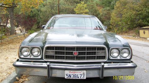 1973 Ford Ranchero - Front view of a 1973 Ford Ranchero, its distinctive grille and dual headlights.