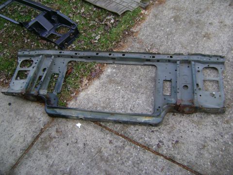 1994 Ford Bronco - This is a vehicle's radiator support frame, showing signs of rust and wear, likely, wear from a disassembled vehicle.