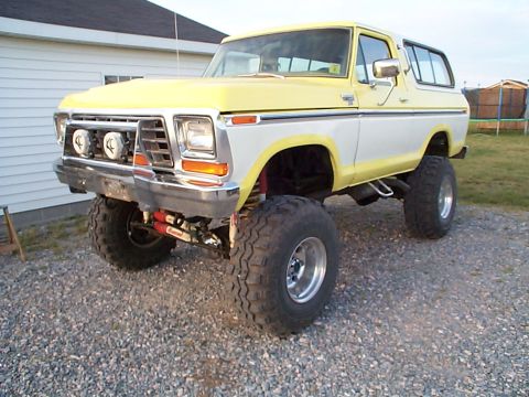 1978 Ford Bronco - This modified 1978 Ford Bronco features a significant lift kit and custom two-tone paint scheme.