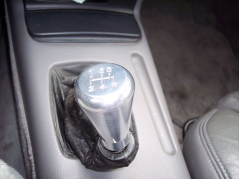 1992 Ford Taurus - Interior shot of a manual transmission shift knob and boot.