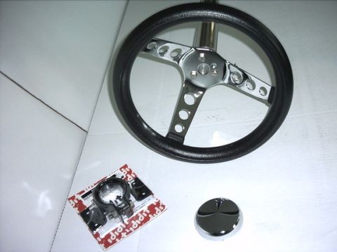 1954 Ford F-100 - Here's the steering wheel, steering column and lower steering column mounting bracket. The steering wheel is a Grant classic wheel that I b…