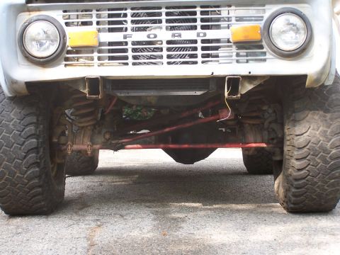 1973 Ford Bronco - Front view of a 1973 Ford Bronco, showing its grille, headlights, and suspension components.