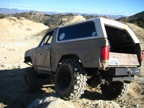 1989 Ford Bronco - This modified Ford Bronco is shown off-road with its large tires and lifted suspension.