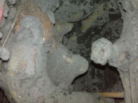 1992 Ford F-350 - This image shows heavily corroded suspension components, making identification of the vehicle year or model impossible.