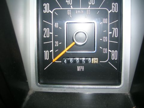 1975 Ford F-250 - The odometer reads 46,959 miles on this vehicle's gauge cluster.