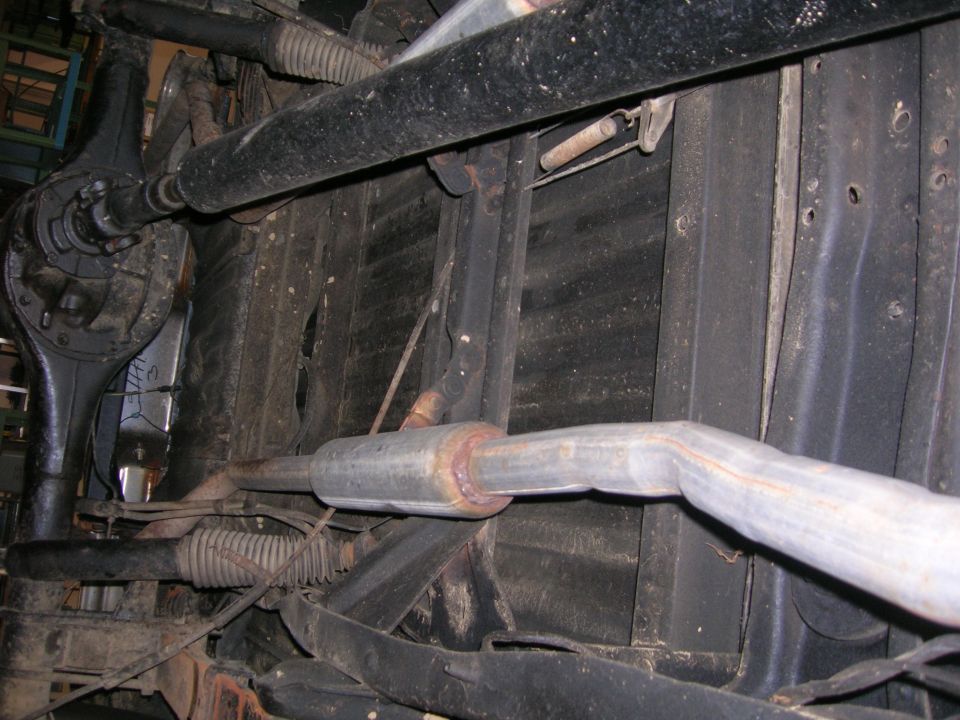 Underside view of 1975 Ford F-250 showing exhaust and rear axle