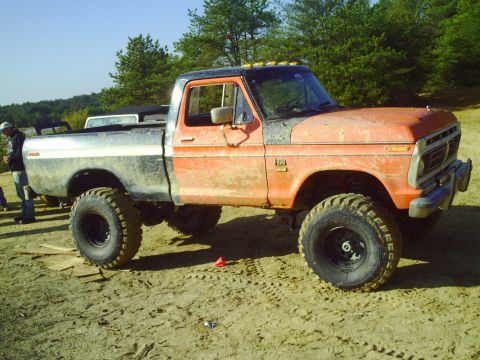 1990 Ford Bronco - This lifted pickup truck appears to be from the late 1970s, not a 1990 Ford Bronco.