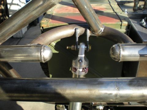Suzuki Samurai - Custom suspension part with visible branding, likely for off-road use.