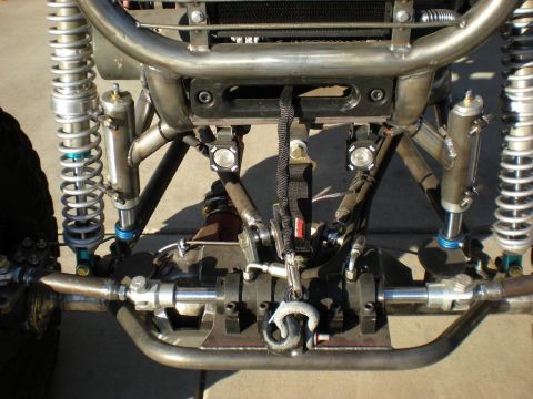 2009 Suzuki Samurai - Custom front suspension and axle assembly with a winch and tow hook.