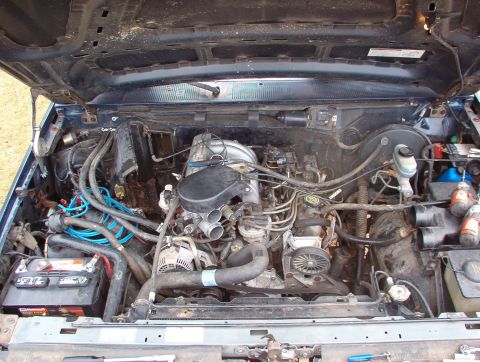 1993 Ford Bronco - Even working alone, it's fairly easy to lift the entire refrigerant system out of the engine bay as a sealed unit. I'm going to install tha…