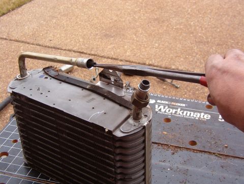 1993 Ford Bronco - After recovering the refrigerant (using the proper equipment according to applicable laws), remove the orifice tube from the evaporator cor…