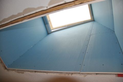 1996 Ford Bronco - The interior of a skylight tunnel is shown during construction, with blue drywall panels installed.