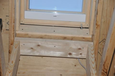1996 Ford Bronco - Installation of a skylight in a wooden structure, showing framing and plywood.