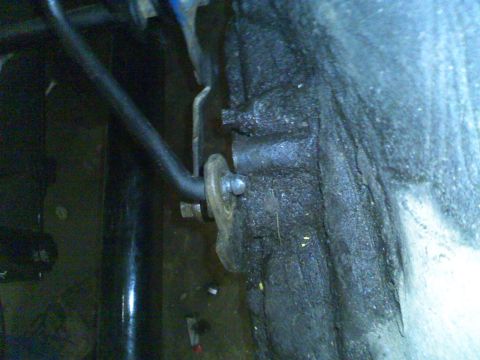 1979 Ford F-250 - Detail of a vehicle's suspension system, showing a linkage and mounting hardware. The registry claims this is a 1979 Ford F-250, but the im…