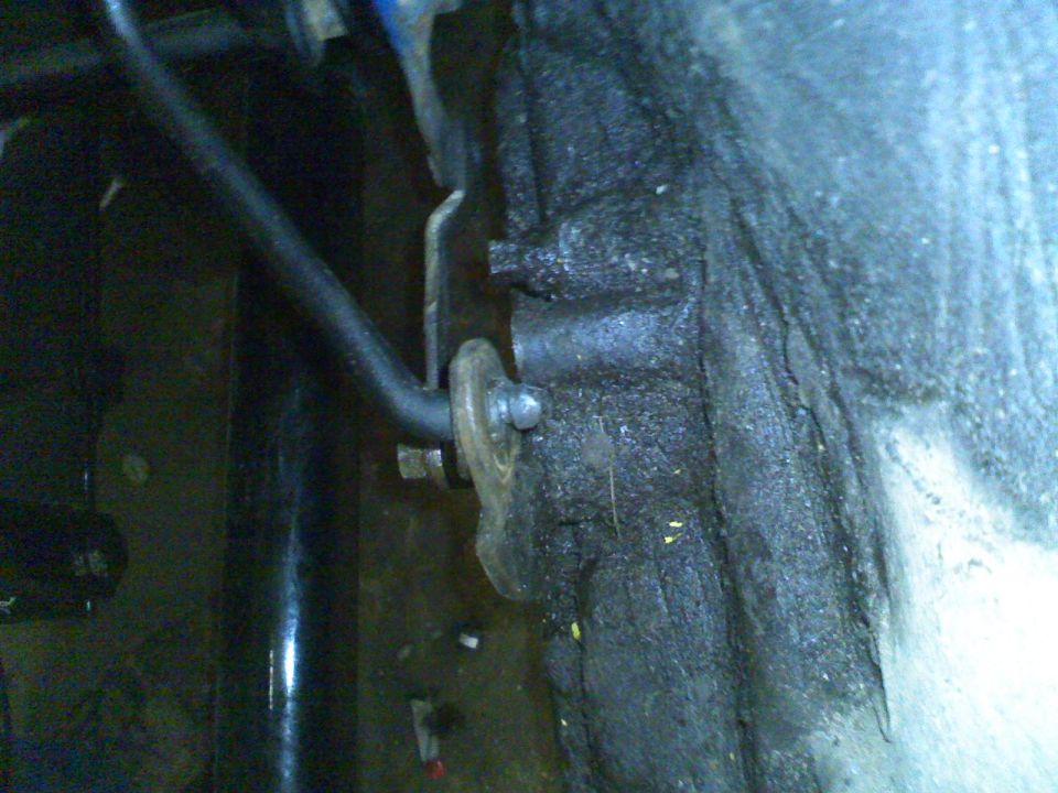 Close-up of a suspension linkage and mounting bracket