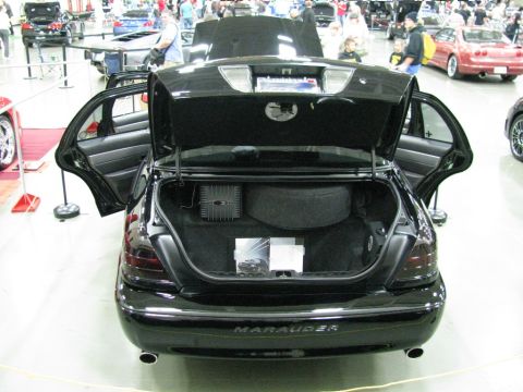 2003 Mercury Marauder - A black 2003 Mercury Marauder is displayed with its trunk and doors open at a car show.