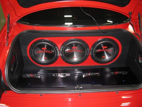 2003 Mercury Marauder - Custom car trunk audio system with multiple subwoofers and amplifiers.