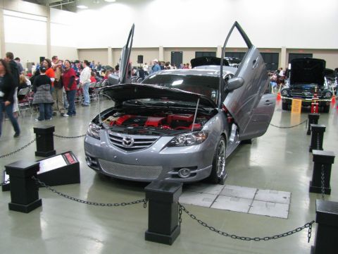 2003 Mercury Marauder - Modified Mazda 6 on display at a car show, custom gullwing doors and engine modifications.