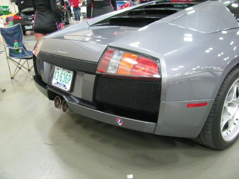 2003 Mercury Marauder - Rear view of a grey Lamborghini showing its distinctive taillights and quad exhaust system.