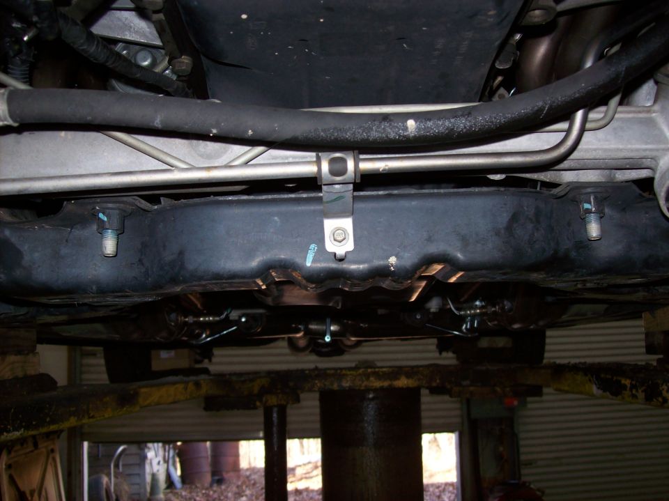 Underbody view of 2007 Ford Mustang showing exhaust headers and suspension components