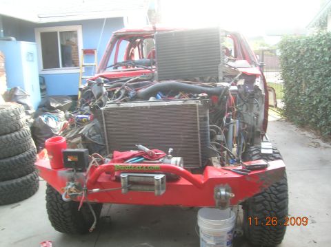 1985 Ford Bronco - This vehicle is in a state of disrepair and appears to be undergoing modifications or repairs.