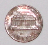 1998 Ford Crown Victoria - A close-up view of the reverse side of a US penny, the Lincoln Memorial engraving.