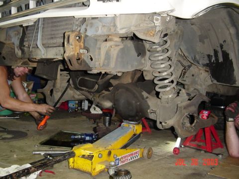1987 Ford Bronco - Prying the bent beam out