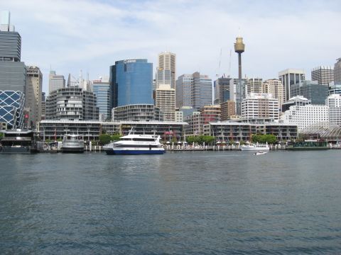2008 Ford F-250 - A view of the Sydney skyline from the water, several boats and modern architecture.