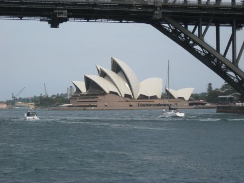 2008 Ford F-250 - A view of the Sydney Opera House and Harbour Bridge from the water, with boats sailing by.