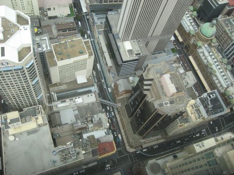 2008 Ford F-250 - An overhead perspective captures a busy city street scene with multiple buildings and vehicles.