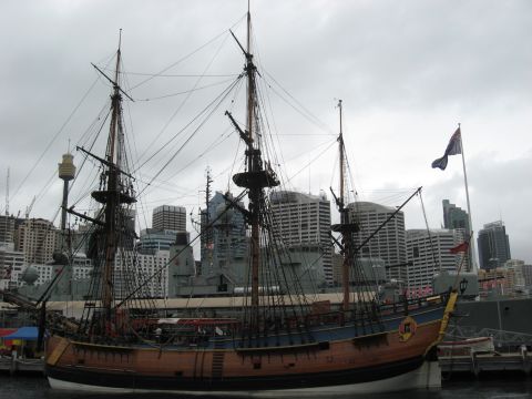 2008 Ford F-250 - A historic tall ship is moored in a harbor, with the Sydney skyline visible behind it.