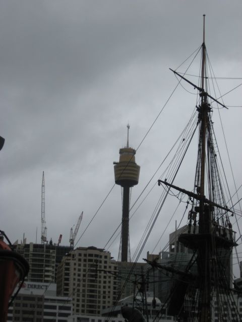 2008 Ford F-250 - A view of Sydney Tower Eye and a tall ship mast with construction cranes in the background under a cloudy sky.