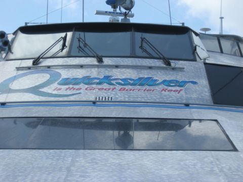 2008 Ford F-250 - The front view of a boat named Quicksilver, which operates in the Great Barrier Reef.