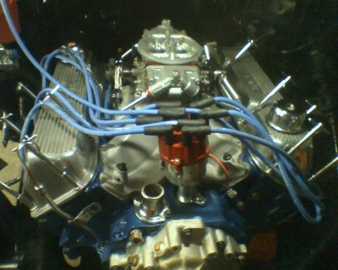 1982 Ford F-100 - Close-up view of a Ford V8 engine, a carburetor and distributor.