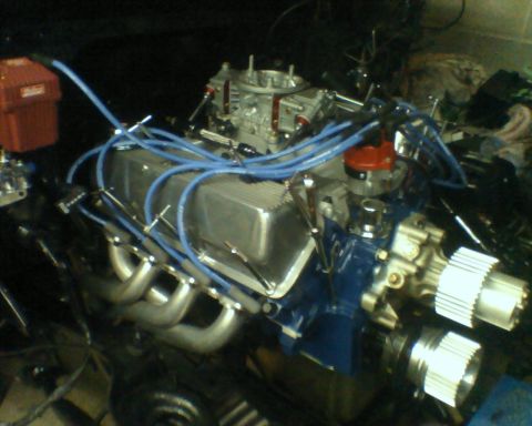 1982 Ford F-100 - Close-up view of an engine assembly, showing various components and wiring.