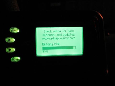2004 Ford F-150 - Edge Evolution programmer screen displays update information and PCM reading progress.
