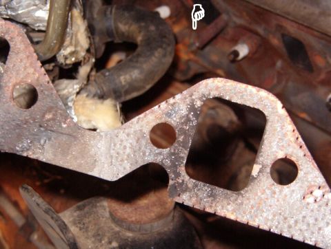 1993 Ford Bronco - Most of the gasket material is gone, leaving only the rusty steel core. This is why gaskets should not be added - Ford designed the manifol…