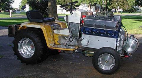 1972 Ford Ranchero - This heavily modified tractor features a large V8 engine and custom chrome wheels.
