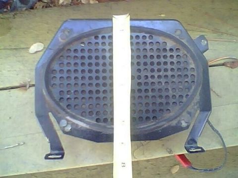 1972 Ford Ranchero - Speaker grille with ruler. The album claims it is a 1972 Ford Ranchero part.