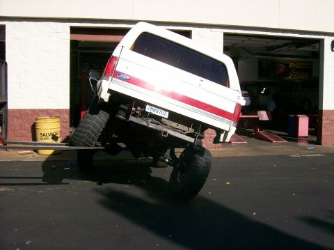 1989 Ford Bronco - This 1989 Ford Bronco is shown from the rear, appearing to be lifted with oversized tires.