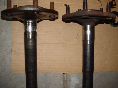 1993 Ford Bronco - Two rear axle shafts are shown, one on the left and one on the right.