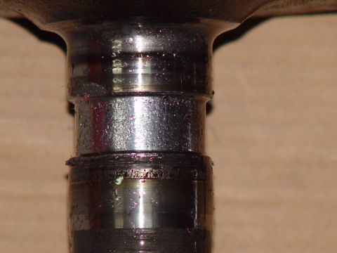 1993 Ford Bronco - A close-up view of a metal axle component, likely showing wear or requiring maintenance.