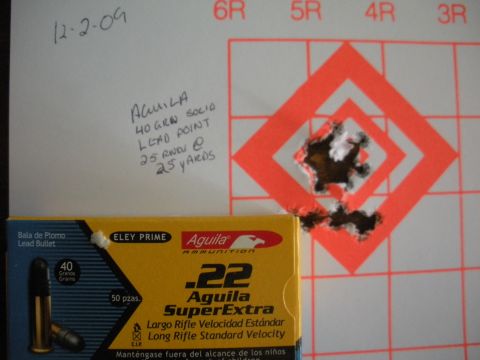 1996 Ford Bronco - Ammunition box and target with handwritten notes detailing the type of ammunition and distance.