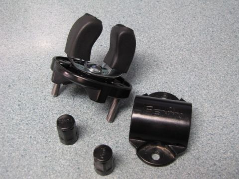 1984 Ford Bronco - A black Fenix clamp and a black mounting bracket with rubber grips are shown, along with two black caps.