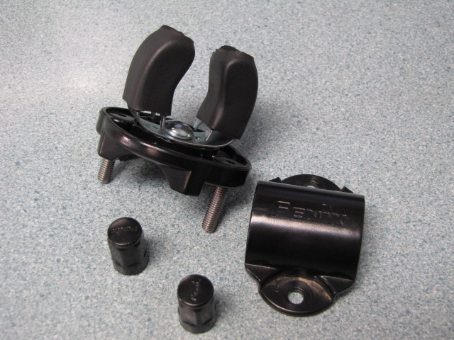 Black metal clamp with 'Fenix' text and a black mounting bracket with rubber grips